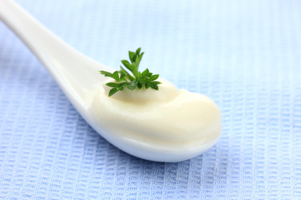 Sour cream in spoon close-up - Фото, изображение