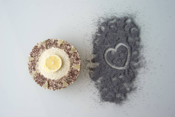Poppy seed cake with lemon on top - Photo, Image