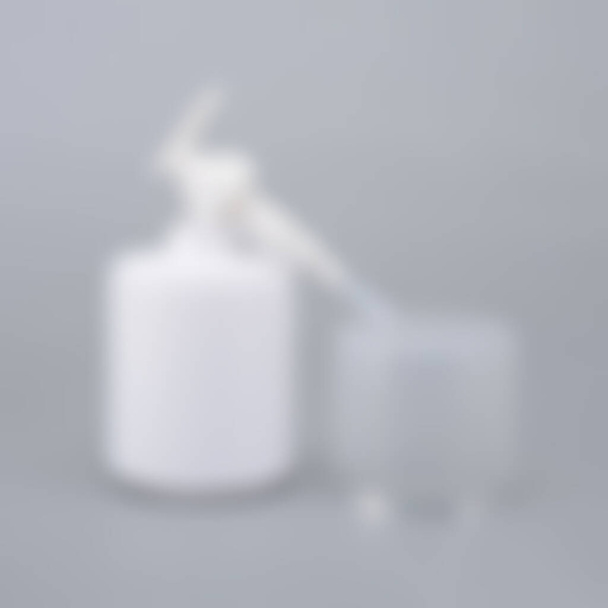 Desinfetante de mão desfocado em garrafa de plástico sobre fundo branco
 - Foto, Imagem