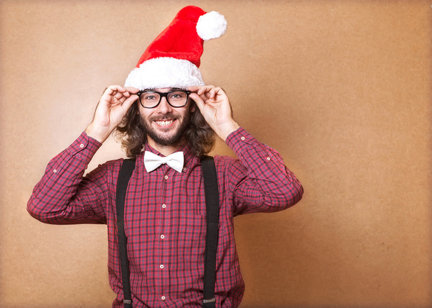 handsome man dressed as Santa Claus. emotional portrait, hipster - Foto, Imagen