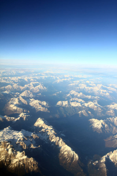 Aerial view on mountains from the plane - Photo, Image