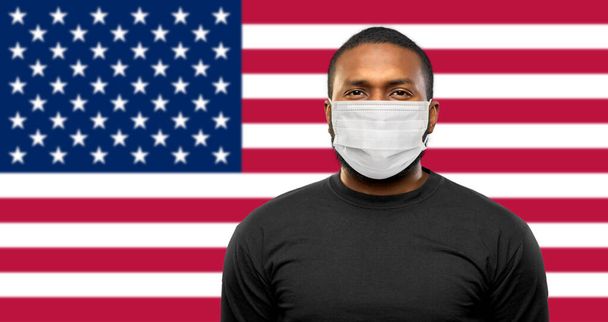 african american man in protective medical mask - Foto, imagen