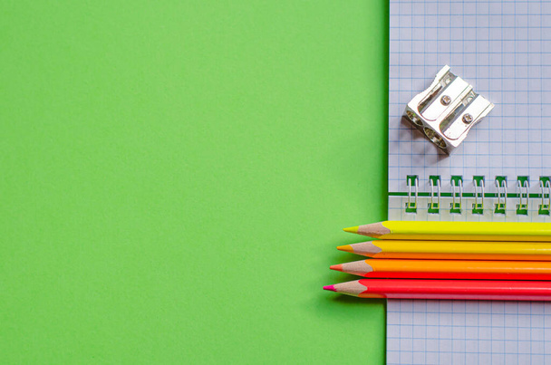 Back to school concept. School and office supplies on office table, green background. Flat lay with copy space. - Foto, Imagen