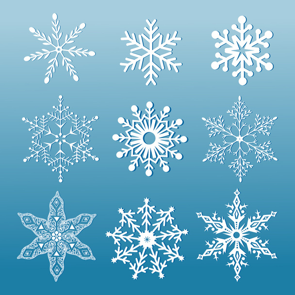 Conjunto de copos de nieve ornamentales
 - Vector, imagen
