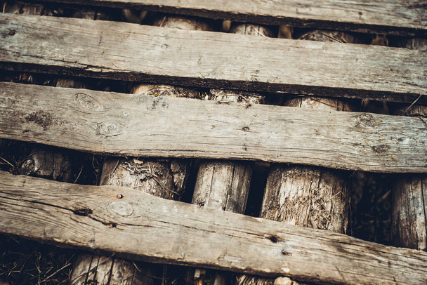 Старі не пофарбовані дошки. Тло з дерева. Текстура дерева. Старий дерев'яний міст. Місце для тексту
 - Фото, зображення