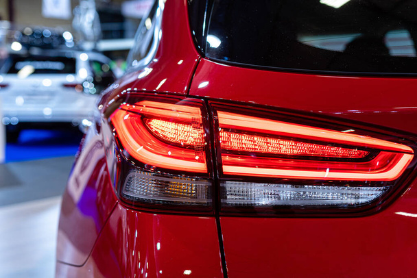 Close-up of the rear light of a modern car. Exterior details - image - Photo, image