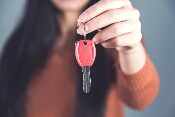 young woman hand holding house key - Фото, зображення