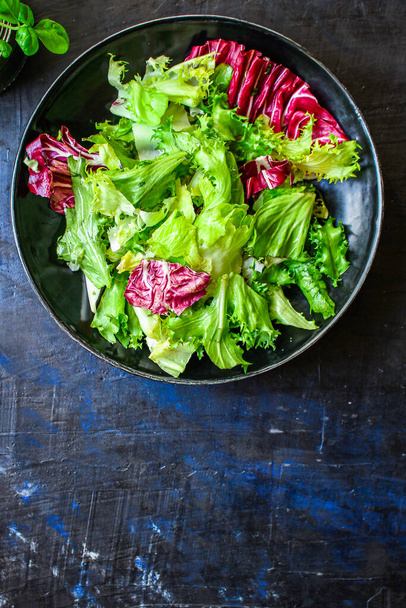 Healthy salad, leaves mix salad (mix micro greens, vegetable juicy snack). food background Image, copy space for text keto or paleo diet - Photo, Image