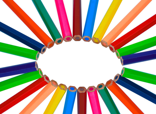 Different colored wood pencil crayons making a nice round circle on a white isolated background - Photo, Image