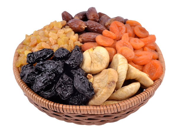 Various dried fruits in wicker bowl - Photo, Image