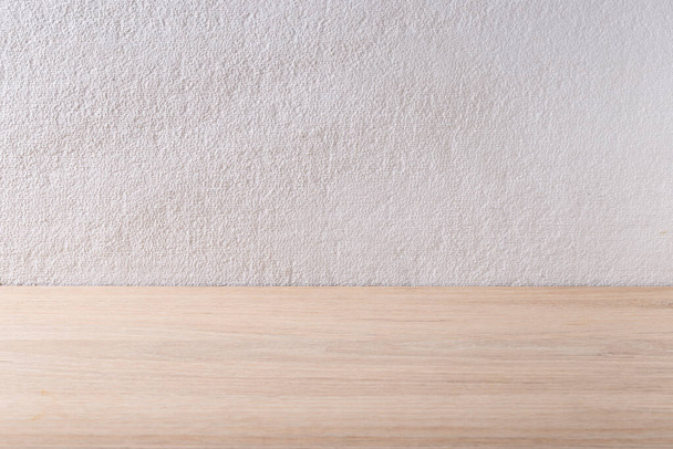 wooden board with white plaster background, rough textured background - Foto, immagini