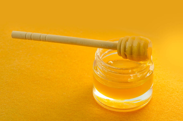 Sweet honey jar. Organic sweet honey jar. Honey with honey dipper - 写真・画像