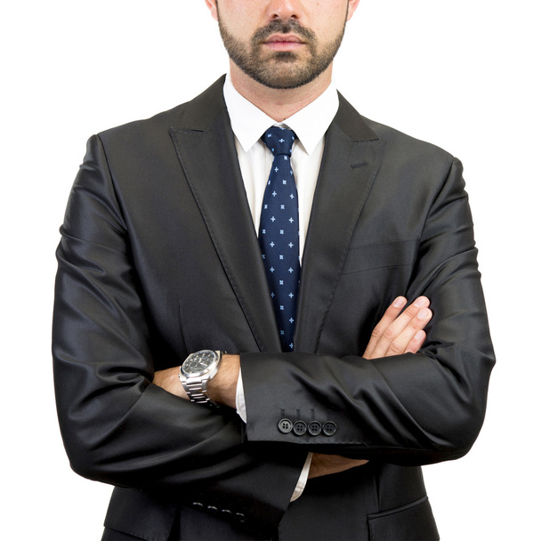 Business man with his arms crossed over isolated background - Foto, afbeelding