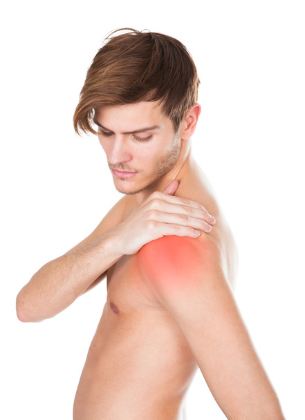 Man Suffering From Shoulder Pain - Foto, afbeelding