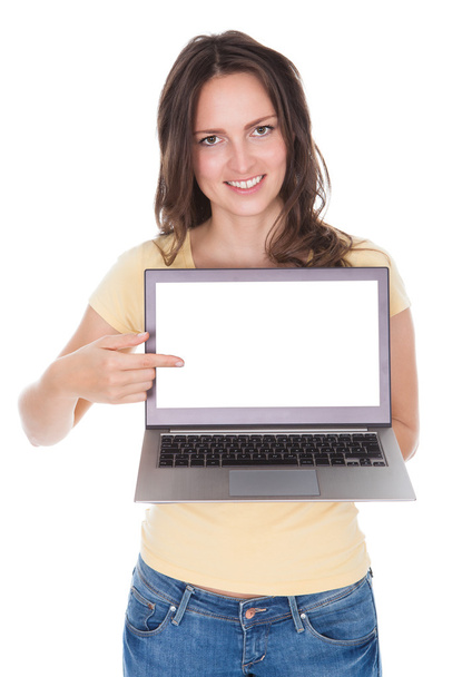 Smiling Woman Holding Laptop - 写真・画像