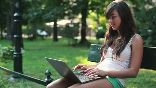 Woman with modern laptop - Кадри, відео