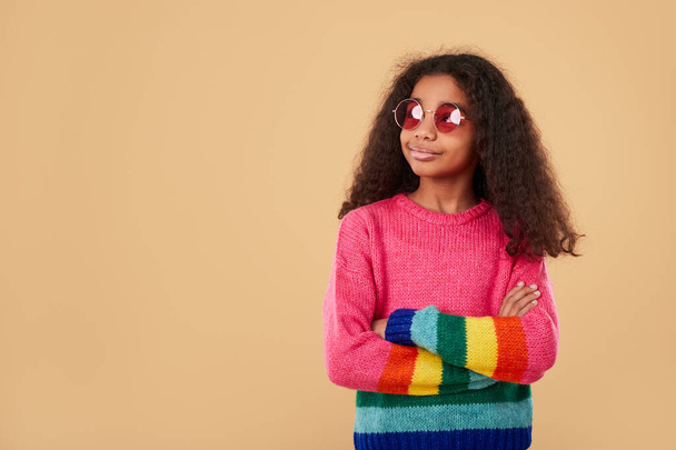 child in rainbow sweater and trendy sunglasses - Fotoğraf, Görsel