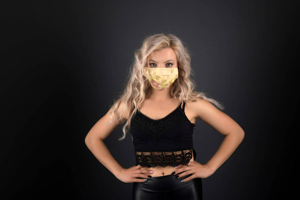 young beautiful woman with respirator mask. covid 19. - Photo, Image