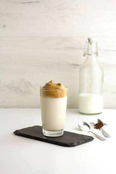 Dalgona coffee. Trendy korean cold drink with foam and milk - Fotoğraf, Görsel