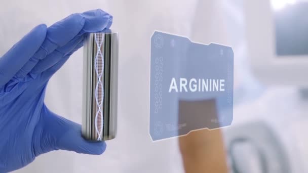 Guante de mano con holograma Arginina - Imágenes, Vídeo