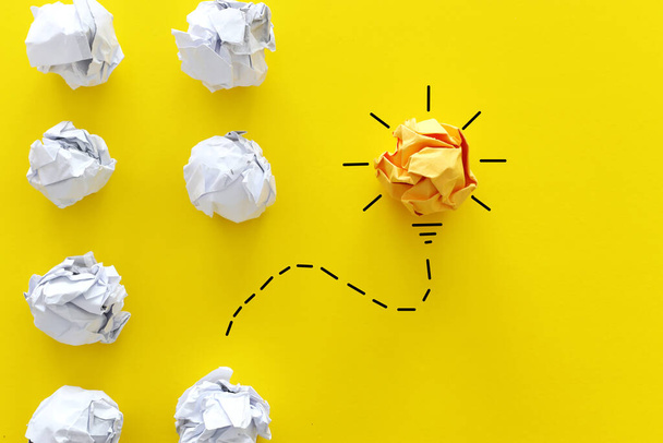 Education concept image. Creative idea and innovation. Crumpled paper as light bulb metaphor - Foto, Bild
