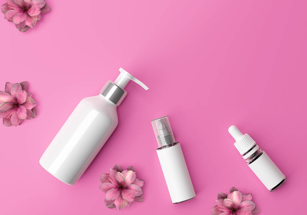 Cosmetics flat lay on pink background. Bottle of lottion, serum and spray. - Photo, Image