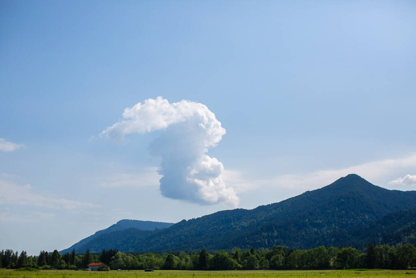 Cloud in the form of an animal over a mountain - Fotó, kép