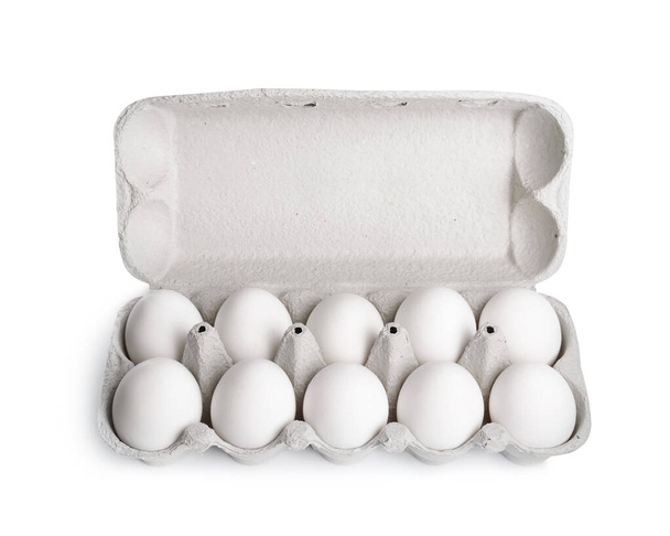 Box with chicken eggs isolated on white - Foto, Imagen