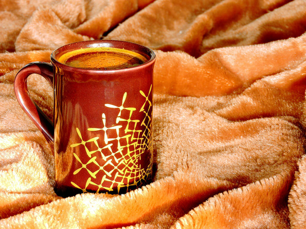 Morning coffee in a soft plaid. - Photo, Image