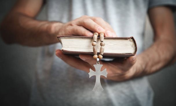 Caucasian man holding Bible. Religion - Photo, Image
