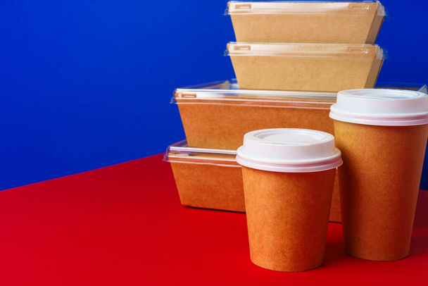 Takeaway food concept. Some packed food in container with coffee cup - Foto, immagini