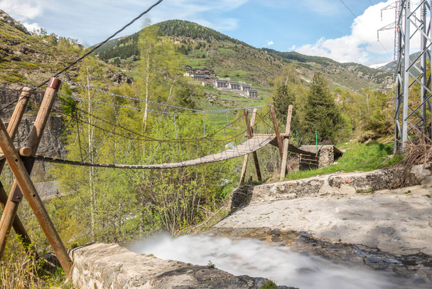 Canillo, Andorra : 6 mat 2020 : Suspension bridge over the Rio de la Bor, Canillo in Anodrra in spring - Photo, Image