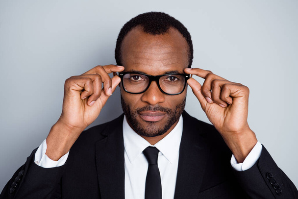 Close-up portrait of his he nice attractive classy content luxury guy company leader partner touching specs healthy eyecare isolated over grey pastel color background - Fotoğraf, Görsel