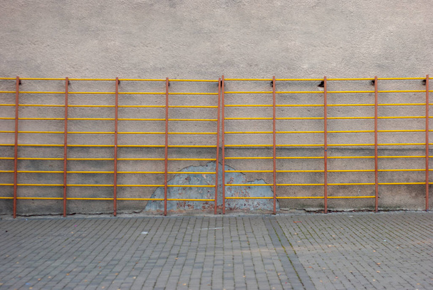 Horizontal bars on grey background outdoor. - Photo, Image