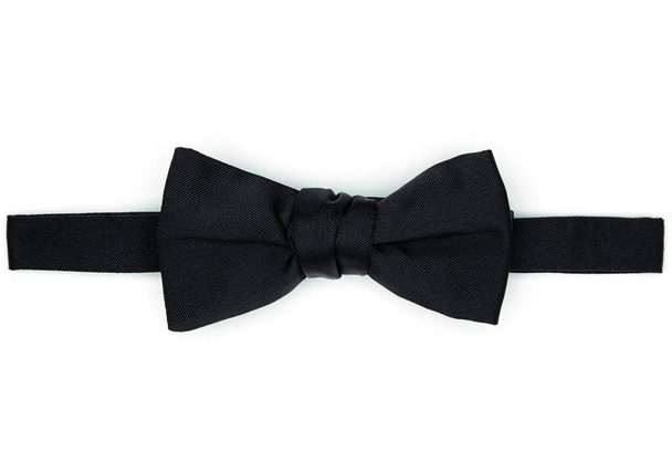 Classic black Bow Tie, black tuxedo accessories, isolated, classic man style. black bow tie isolated on white background, closeup. - Photo, Image