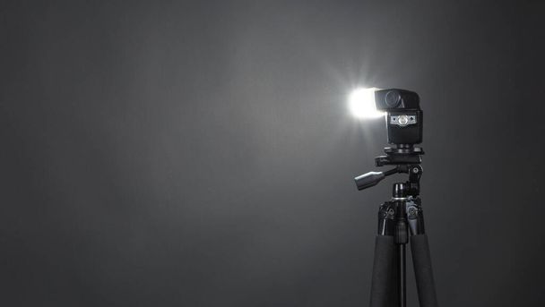 Studio light and back drop and soft box set up for shooting photo or video production which includes flashlight and continue lighting on tripod and paper background and used for photographer or videographer - Photo, Image