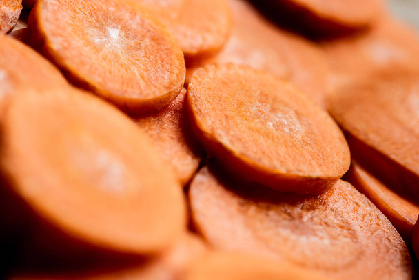 close up view of fresh ripe carrot slices - Fotografie, Obrázek