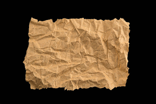 Piece of recycled paper for text isolated on black background - Foto, Imagem