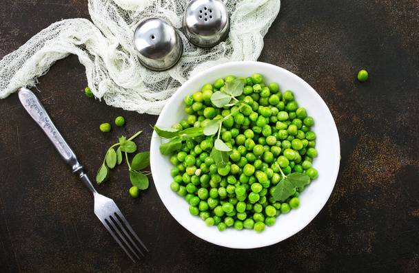 green peas in bowl , fresh peas, stock photo - Foto, Bild