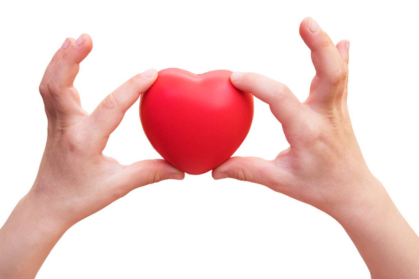 Heart in hands on light background. Healthcare background. - Photo, Image
