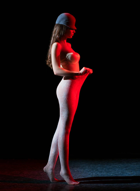 girl stands in beautiful tights - Foto, imagen