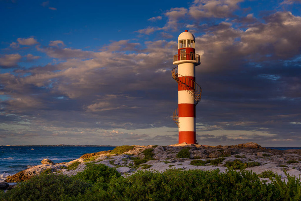 Lighthouse at sunset in twilight in clear weather - Photo, Image