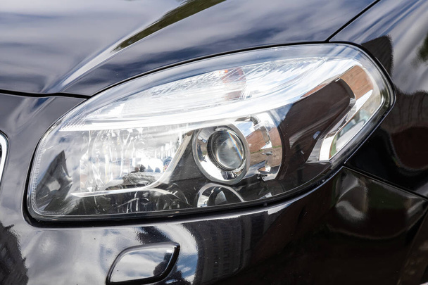 Novosibirsk/ Russia  May 02 2020: Renault Koleos,  modern black car xenon lamp headlight. Detail light close up of on new car. Exterior detail   - Photo, Image