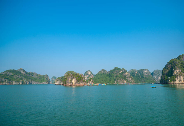 Halong Bay, beautiful dramatic and calm in morning light popular tourism destination in Vietnam. - Photo, Image