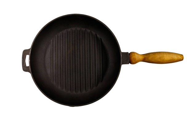 Empty cast iron grill frying pan isolated on white background - Photo, Image