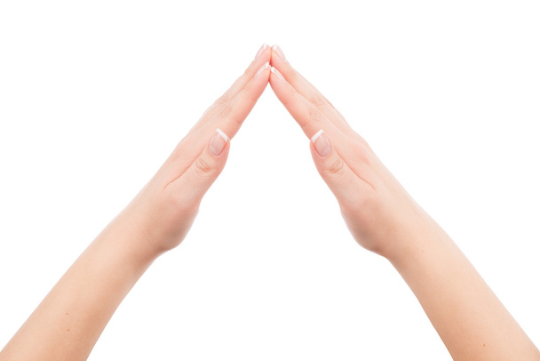 Mãos de mulher mostrando gesto símbolo casa
 - Foto, Imagem