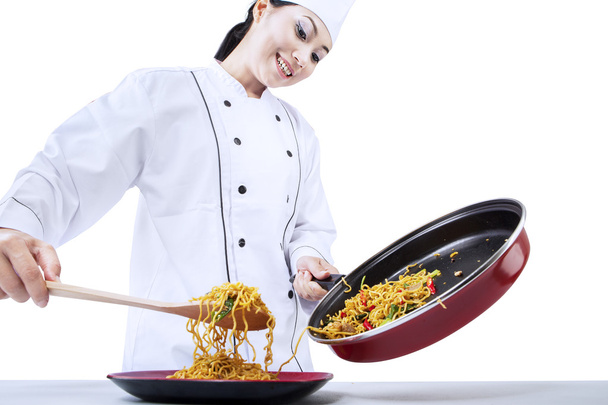 Chef cooks fried noodle - Foto, Imagen