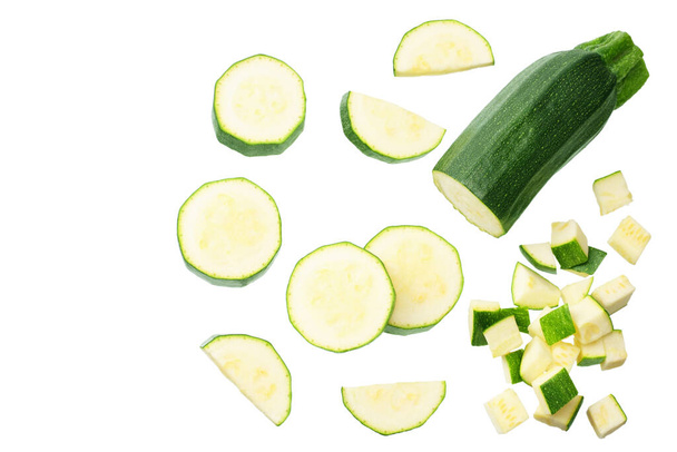 fresh green zucchini with slices isolated on white background. top view - Fotografie, Obrázek
