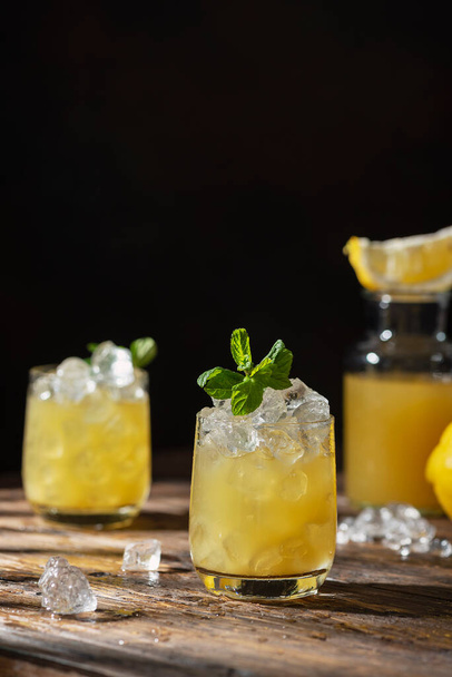 Summer cold cocktail with strong sun lights, selective focus image - 写真・画像