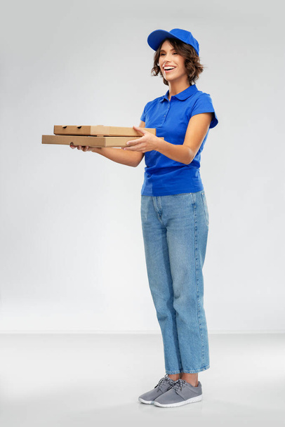 happy smiling delivery woman with pizza boxes - Foto, Imagem